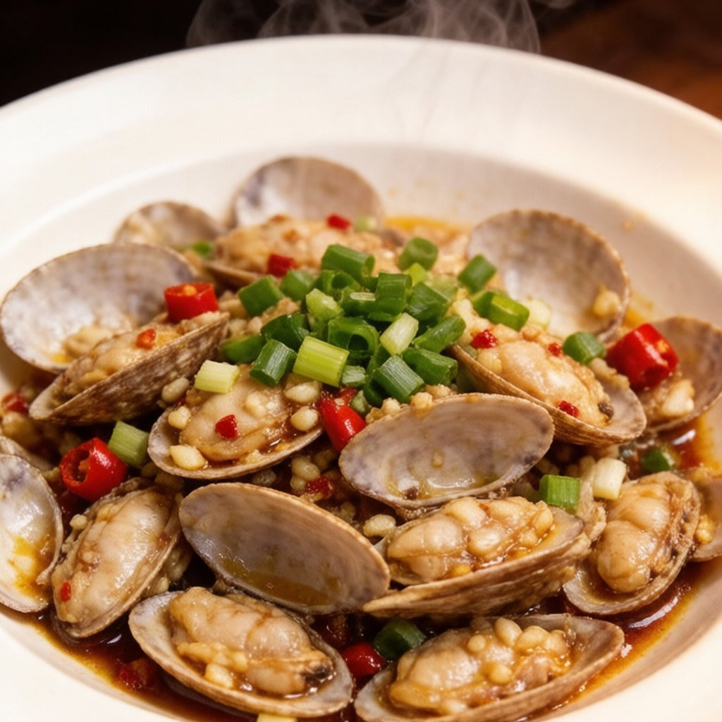 Garlic stir-fried clams in a white bowl