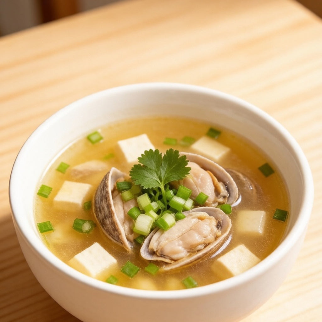 Clam soup with ginger and scallion